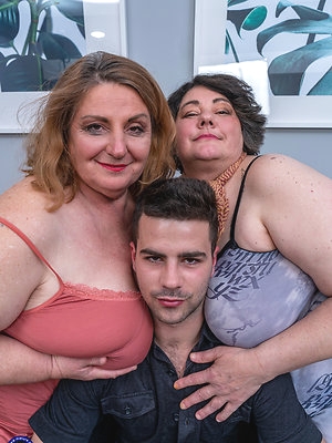 Big breasted threesome with one lucky toyboy